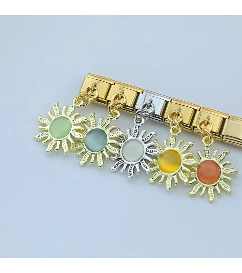 Golden Sun with Sky Blue Resin Gem - Gold Pendant Charm