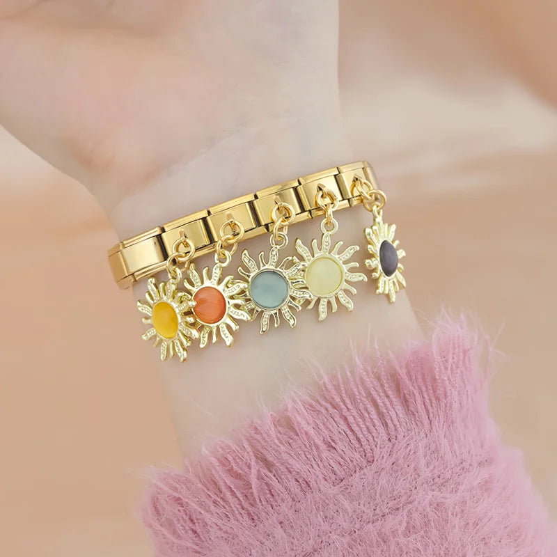 Golden Sun with Sky Blue Resin Gem - Gold Pendant Charm